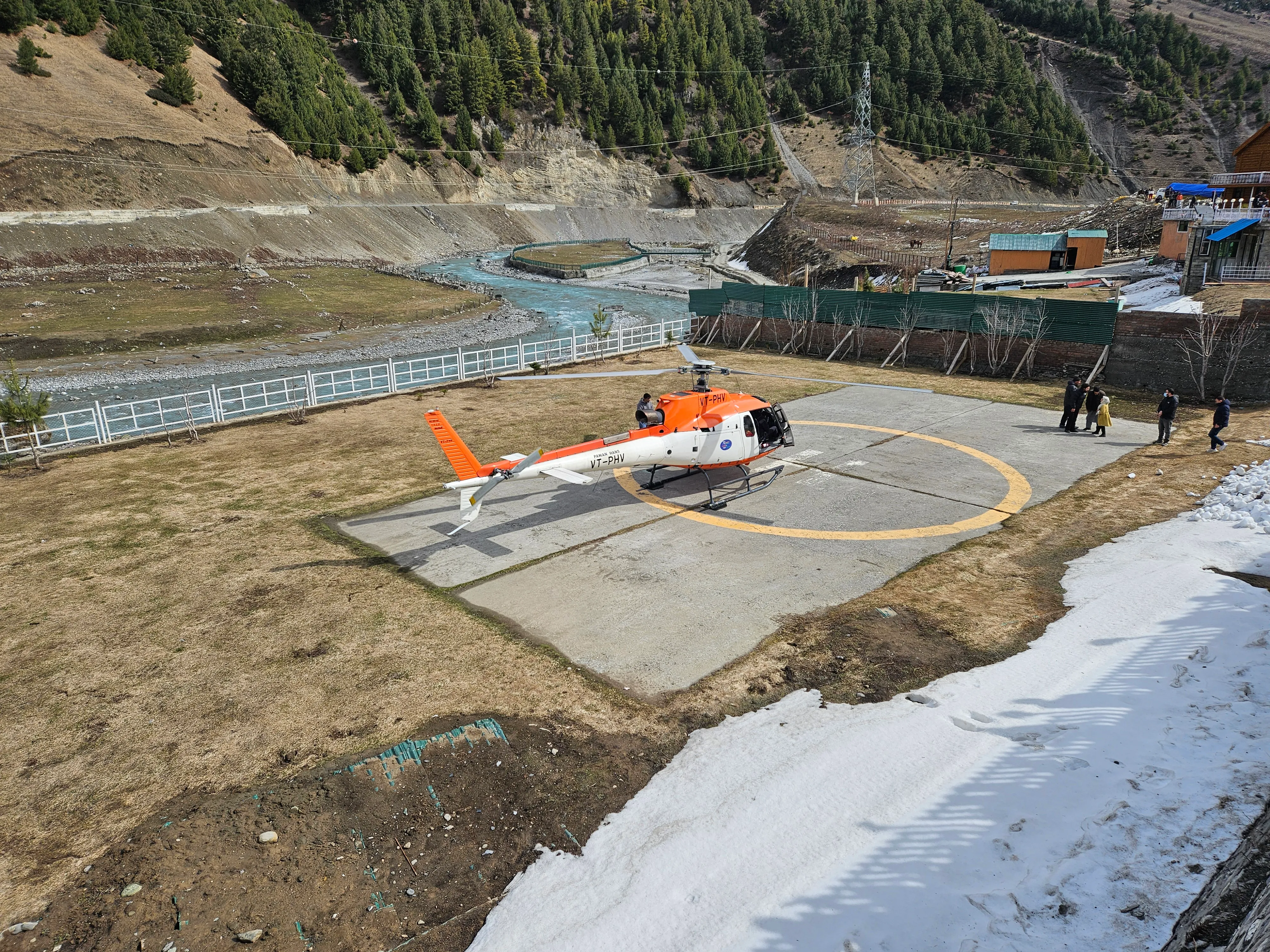 Private helicopter on Sindh Resorts helipad with Himalayan views